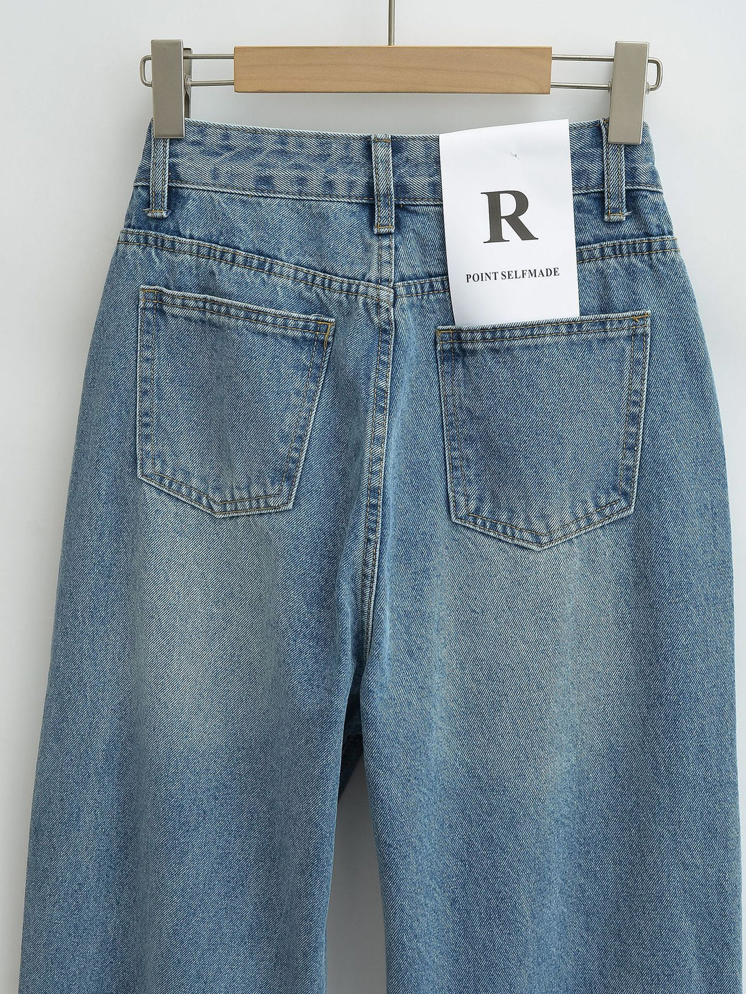 Dammjeans med hög midja, tvättad effekt och vid ben