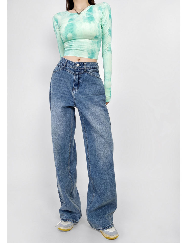Dammjeans med hög midja, tvättad effekt och vid ben