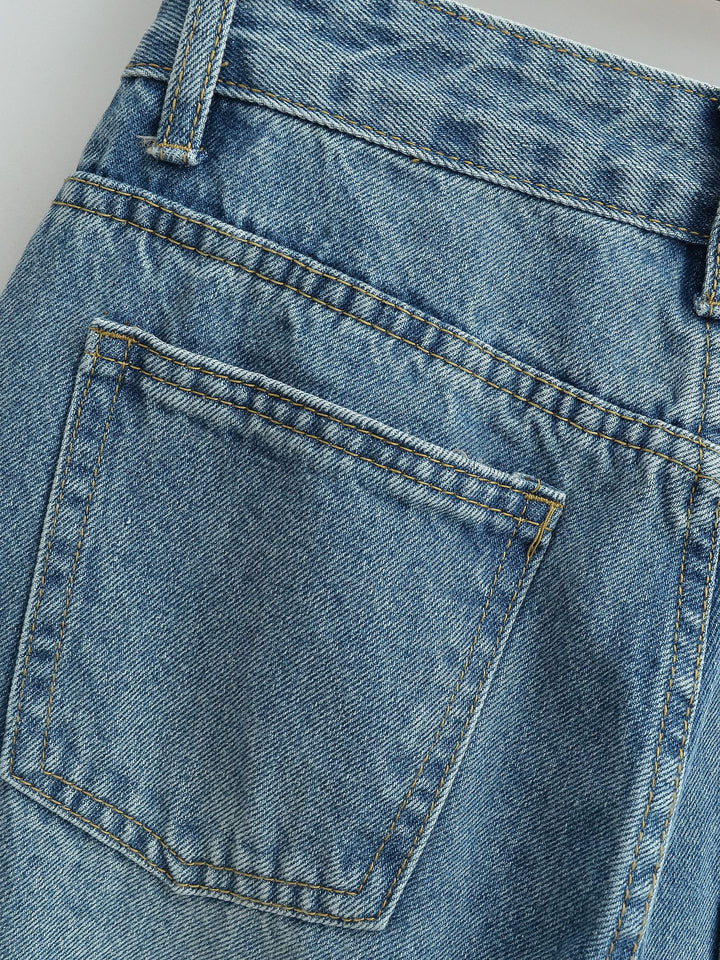 Dammjeans med hög midja, tvättad effekt och vid ben